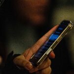 person playing game on their phone