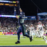 Feb 8, 2026; Santa Clara, CA, USA; Seattle Seahawks tight end AJ Barner (88) makes a catch to score a touchdown against the New England Patriots during the fourth quarter in Super Bowl LX at Levi's Stadium. Mandatory Credit: Mark J. Rebilas-Imagn Images