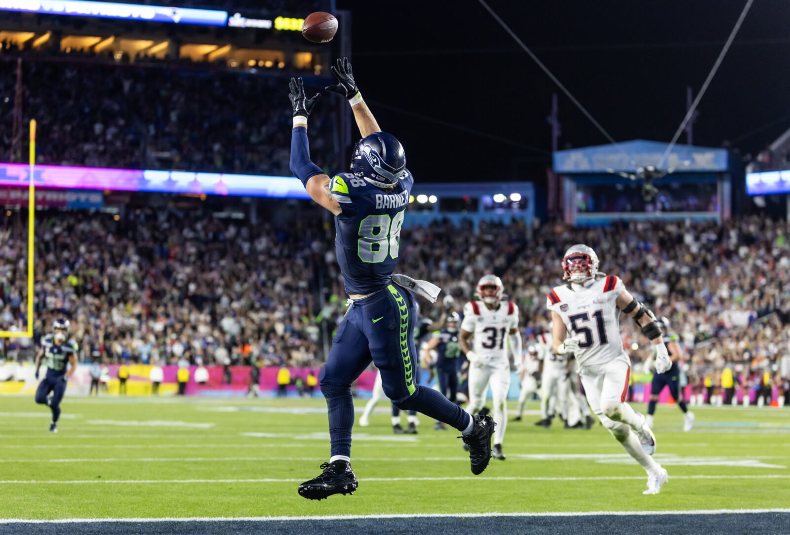 Feb 8, 2026; Santa Clara, CA, USA; Seattle Seahawks tight end AJ Barner (88) makes a catch to score a touchdown against the New England Patriots during the fourth quarter in Super Bowl LX at Levi's Stadium. Mandatory Credit: Mark J. Rebilas-Imagn Images
