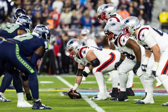 Feb 8, 2026; Santa Clara, CA, USA;General view down the line of scrimmage as New England Patriots center Garrett Bradbury (65) prepares to snap the ball against the Seattle Seahawks during Super Bowl LX at Levi's Stadium. Mandatory Credit: Mark J. Rebilas-Imagn Images