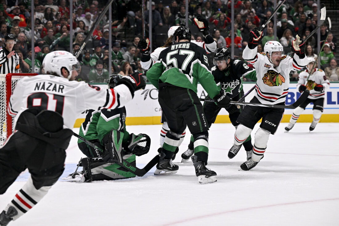 Mar 8, 2026; Dallas, Texas, USA; Chicago Blackhawks center Frank Nazar (91) and center Ryan Donato (8) celebrate the game tying goal scored by center Connor Bedard (not pictured) against the Dallas Stars during the third period at the American Airlines Center. Mandatory Credit: Jerome Miron-Imagn Images