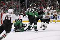 Mar 8, 2026; Dallas, Texas, USA; Chicago Blackhawks center Frank Nazar (91) and center Ryan Donato (8) celebrate the game tying goal scored by center Connor Bedard (not pictured) against the Dallas Stars during the third period at the American Airlines Center. Mandatory Credit: Jerome Miron-Imagn Images