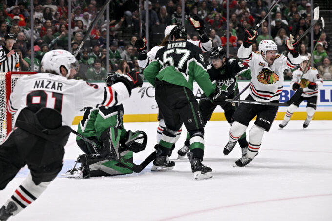 Mar 8, 2026; Dallas, Texas, USA; Chicago Blackhawks center Frank Nazar (91) and center Ryan Donato (8) celebrate the game tying goal scored by center Connor Bedard (not pictured) against the Dallas Stars during the third period at the American Airlines Center. Mandatory Credit: Jerome Miron-Imagn Images