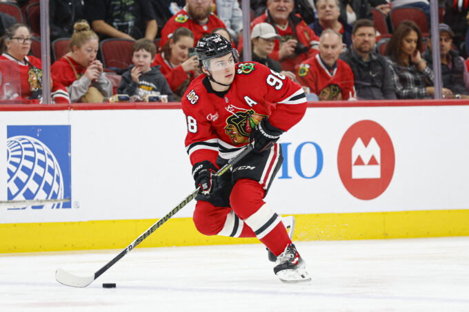 Mar 9, 2026; Chicago, Illinois, USA; Chicago Blackhawks center Connor Bedard (98) looks to pass the puck against the Utah Mammoth during the first period at United Center. Mandatory Credit: Kamil Krzaczynski-Imagn Images