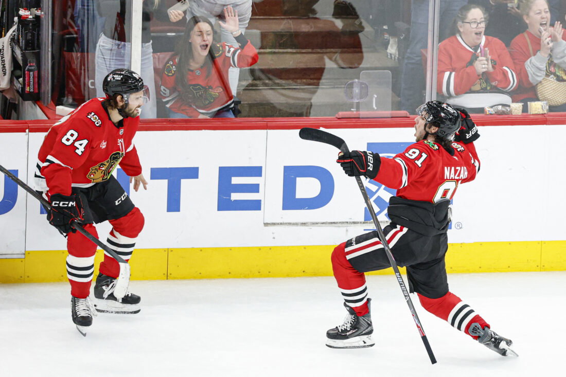 Mar 9, 2026; Chicago, Illinois, USA; Chicago Blackhawks center Frank Nazar (91) celebrates after scoring a game winning goal against the Utah Mammoth in overtime at United Center. Mandatory Credit: Kamil Krzaczynski-Imagn Images