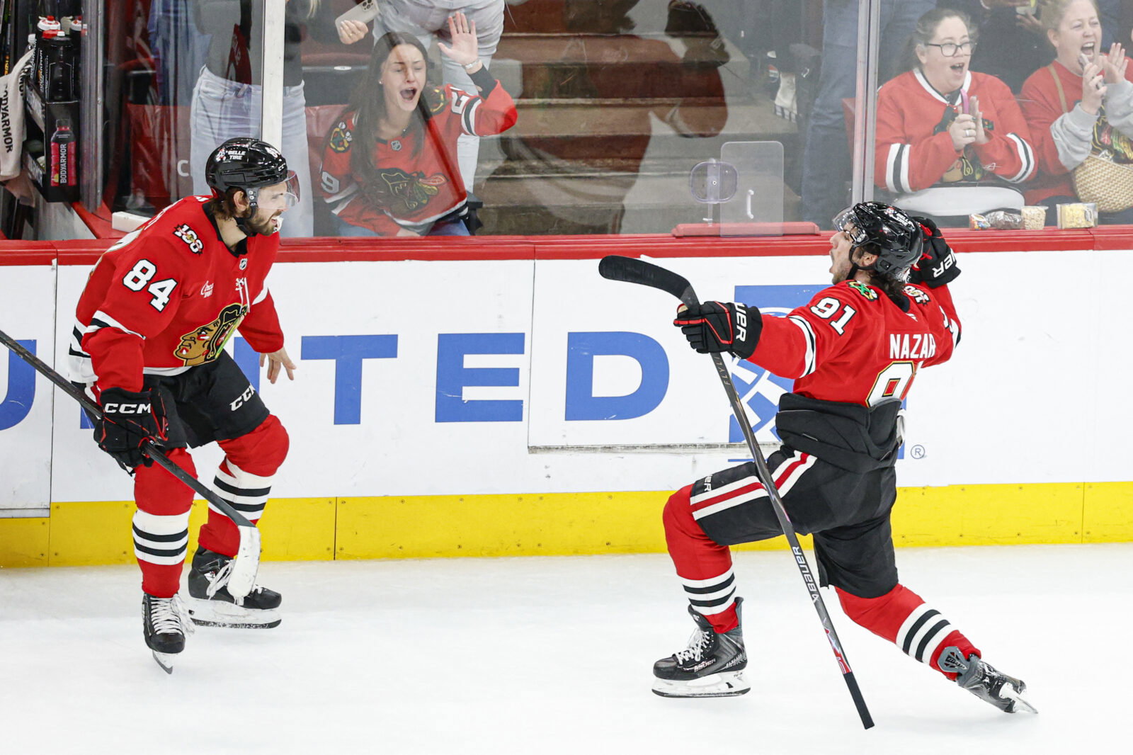 Mar 9, 2026; Chicago, Illinois, USA; Chicago Blackhawks center Frank Nazar (91) celebrates after scoring a game winning goal against the Utah Mammoth in overtime at United Center. Mandatory Credit: Kamil Krzaczynski-Imagn Images