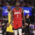 Mar 16, 2026; Houston, Texas, USA; Houston Rockets forward Dorian Finney-Smith (2) reacts after a turover during the fourth quarter against the Los Angeles Lakers at Toyota Center. Mandatory Credit: Troy Taormina-Imagn Images