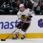 Apr 6, 2026; San Jose, California, USA; Chicago Blackhawks center Frank Nazar (91) advances the puck against the San Jose Sharks in the third period at SAP Center at San Jose. Mandatory Credit: David Gonzales-Imagn Images