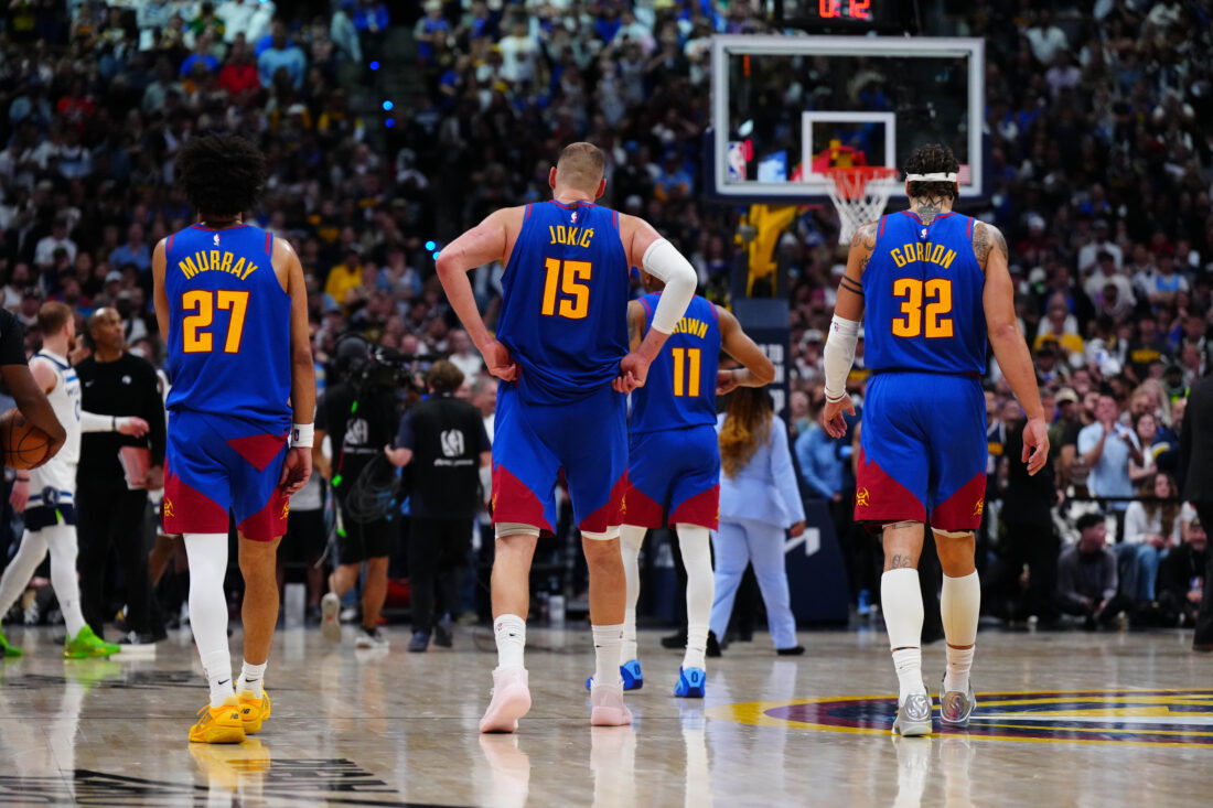 Apr 20, 2026; Denver, Colorado, USA; Denver Nuggets guard Jamal Murray (27), center Nikola Jokic (15) and forward Aaron Gordon (32) in the fourth quarter against the Minnesota Timberwolves during game two of the first round of the 2026 NBA Playoffs at Ball Arena. Mandatory Credit: Ron Chenoy-Imagn Images