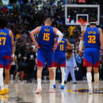 Apr 20, 2026; Denver, Colorado, USA; Denver Nuggets guard Jamal Murray (27), center Nikola Jokic (15) and forward Aaron Gordon (32) in the fourth quarter against the Minnesota Timberwolves during game two of the first round of the 2026 NBA Playoffs at Ball Arena. Mandatory Credit: Ron Chenoy-Imagn Images