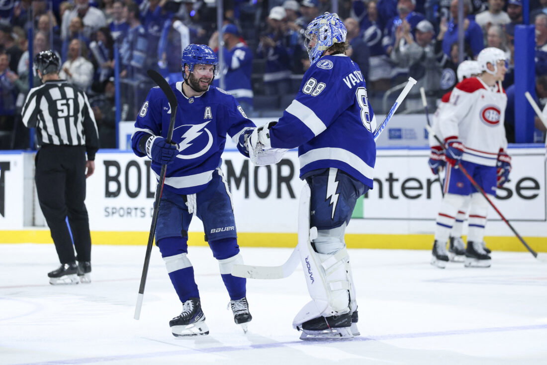 Apr 21, 2026; Tampa, Florida, USA; Tampa Bay Lightning right wing Nikita Kucherov (86) and goaltender Andrei Vasilevskiy (88) react after beating the Montreal Canadiens in overtime during game two of the first round of the 2026 Stanley Cup Playoffs at Benchmark International Arena. Mandatory Credit: Nathan Ray Seebeck-Imagn Images