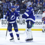 Apr 21, 2026; Tampa, Florida, USA; Tampa Bay Lightning right wing Nikita Kucherov (86) and goaltender Andrei Vasilevskiy (88) react after beating the Montreal Canadiens in overtime during game two of the first round of the 2026 Stanley Cup Playoffs at Benchmark International Arena. Mandatory Credit: Nathan Ray Seebeck-Imagn Images