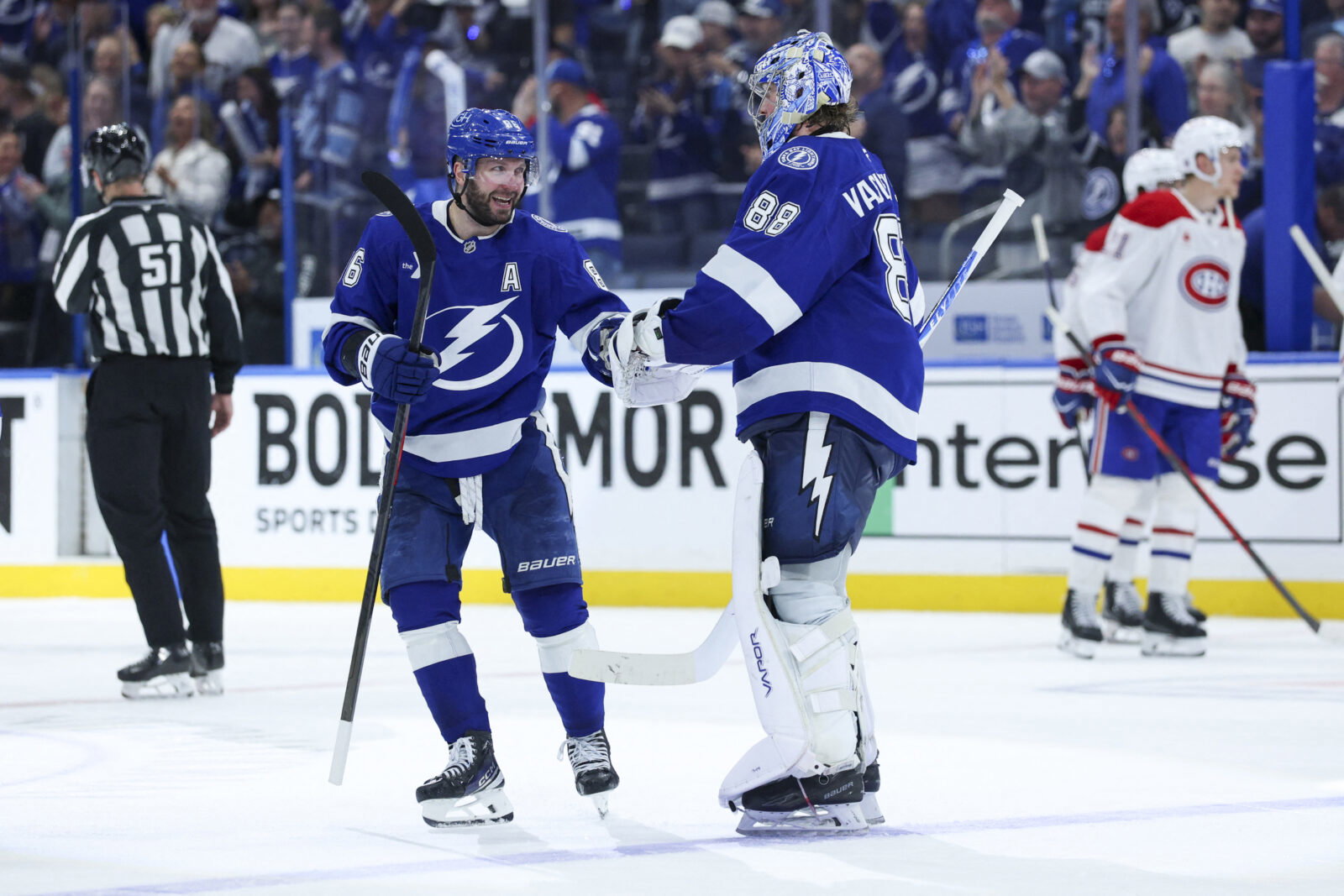 Apr 21, 2026; Tampa, Florida, USA; Tampa Bay Lightning right wing Nikita Kucherov (86) and goaltender Andrei Vasilevskiy (88) react after beating the Montreal Canadiens in overtime during game two of the first round of the 2026 Stanley Cup Playoffs at Benchmark International Arena. Mandatory Credit: Nathan Ray Seebeck-Imagn Images
