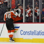 Apr 22, 2026; Philadelphia, Pennsylvania, USA; Philadelphia Flyers center Trevor Zegras (46) celebrates his goal with teammates in the penalty box against the Pittsburgh Penguins during the second period in game three of the first round of the 2026 Stanley Cup Playoffs at Xfinity Mobile Arena. Mandatory Credit: Eric Hartline-Imagn Images