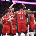 Apr 26, 2026; Houston, Texas, USA; Houston Rockets center Alperen Sengun (28) huddles with teammates during the second quarter against the Los Angeles Lakers during game four of the first round of the 2026 NBA Playoffs at Toyota Center. Mandatory Credit: Troy Taormina-Imagn Images