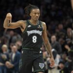 Apr 30, 2026; Minneapolis, Minnesota, USA; Minnesota Timberwolves guard Bones Hyland (8) celebrates making a shot against the Denver Nuggets in the first half during game six of the first round of the 2026 NBA Playoffs at Target Center. Mandatory Credit: Jesse Johnson-Imagn Images