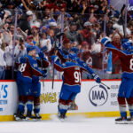 May 13, 2026; Denver, Colorado, USA; Colorado Avalanche center Nathan MacKinnon (29) celebrates his goal with center Martin Necas (88) and center Brock Nelson (11) and ]center Nazem Kadri (91) and defenseman Brent Burns (84) in the third period against the Minnesota Wild in game five of the second round of the 2026 Stanely Cup Playoffs at Ball Arena. Mandatory Credit: Isaiah J. Downing-Imagn Images