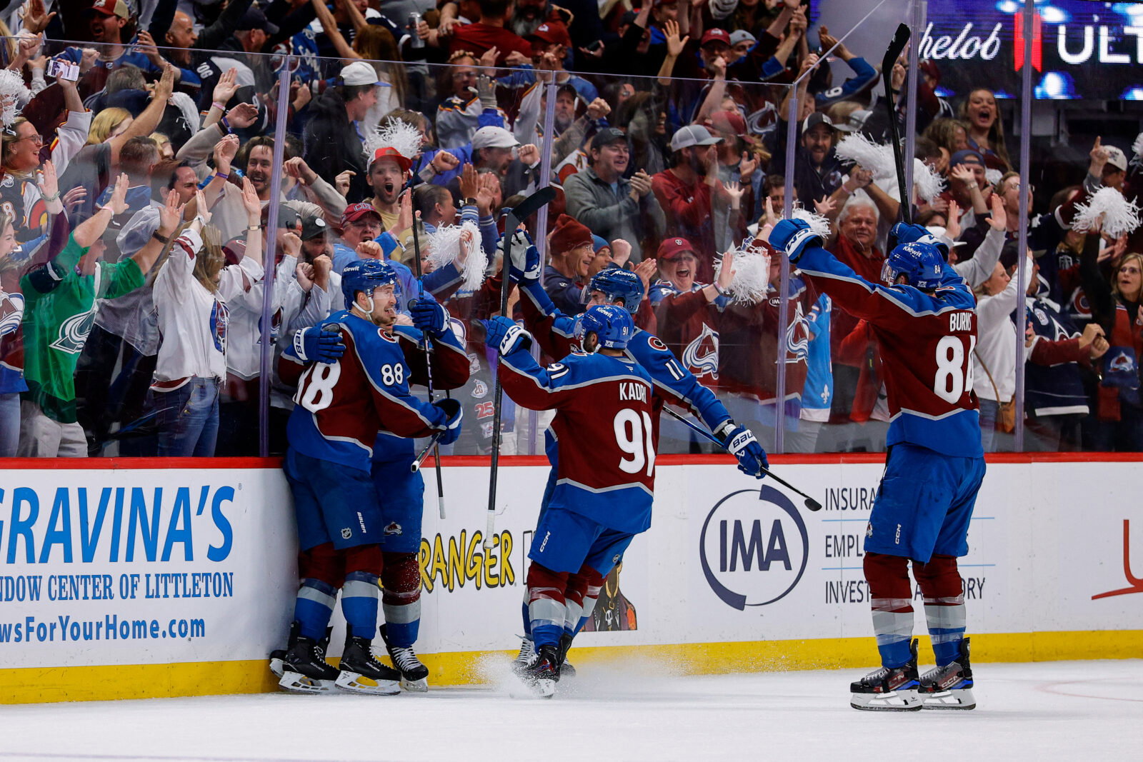May 13, 2026; Denver, Colorado, USA; Colorado Avalanche center Nathan MacKinnon (29) celebrates his goal with center Martin Necas (88) and center Brock Nelson (11) and ]center Nazem Kadri (91) and defenseman Brent Burns (84) in the third period against the Minnesota Wild in game five of the second round of the 2026 Stanely Cup Playoffs at Ball Arena. Mandatory Credit: Isaiah J. Downing-Imagn Images