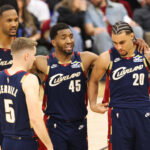May 23, 2026; Cleveland, Ohio, USA; Cleveland Cavaliers guard Donovan Mitchell (45) huddles around teammates during the fourth quarter against the New York Knicks during game three of the eastern conference finals for the 2026 NBA playoffs at Rocket Arena. Mandatory Credit: Scott Galvin-Imagn Images