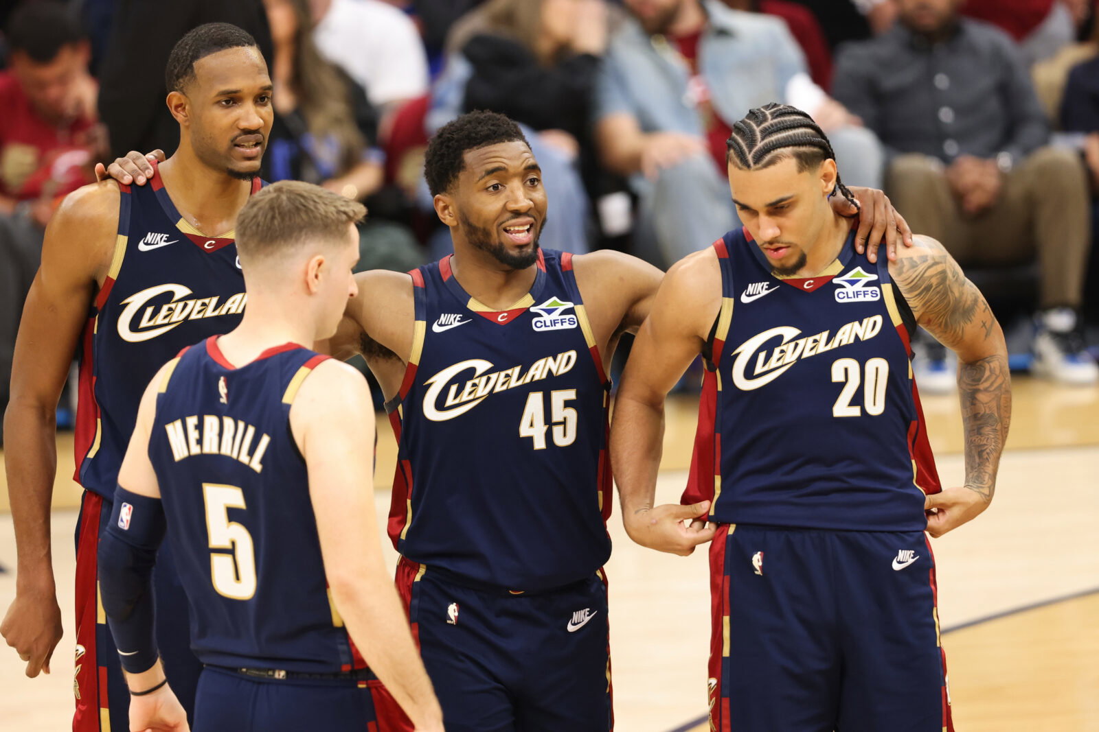 May 23, 2026; Cleveland, Ohio, USA; Cleveland Cavaliers guard Donovan Mitchell (45) huddles around teammates during the fourth quarter against the New York Knicks during game three of the eastern conference finals for the 2026 NBA playoffs at Rocket Arena. Mandatory Credit: Scott Galvin-Imagn Images