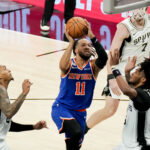 Jun 13, 2026; San Antonio, Texas, USA; New York Knicks guard Jalen Brunson (11) shoots against San Antonio Spurs guard Stephon Castle (5) in the first half during game five of the 2026 NBA Finals at Frost Bank Center. Mandatory Credit: Scott Wachter-Imagn Images