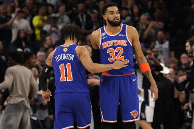 Jun 13, 2026; San Antonio, Texas, USA; New York Knicks guard Jalen Brunson (11) hugs Knicks center Karl-Anthony Towns (32) prior to the opening tip against the San Antonio Spurs in game five of the 2026 NBA Finals at Frost Bank Center. Mandatory Credit: Geoff Burke-Imagn Images