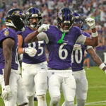 Aug 15, 2026; Baltimore, Maryland, USA; Baltimore Ravens wide receiver Ja’Kobi Lane (6) is greeted by teammates after his touchdown catch during the second quarter against the Philadelphia Eagles at M&T Bank Stadium. Mandatory Credit: Mitch Stringer-Imagn Images