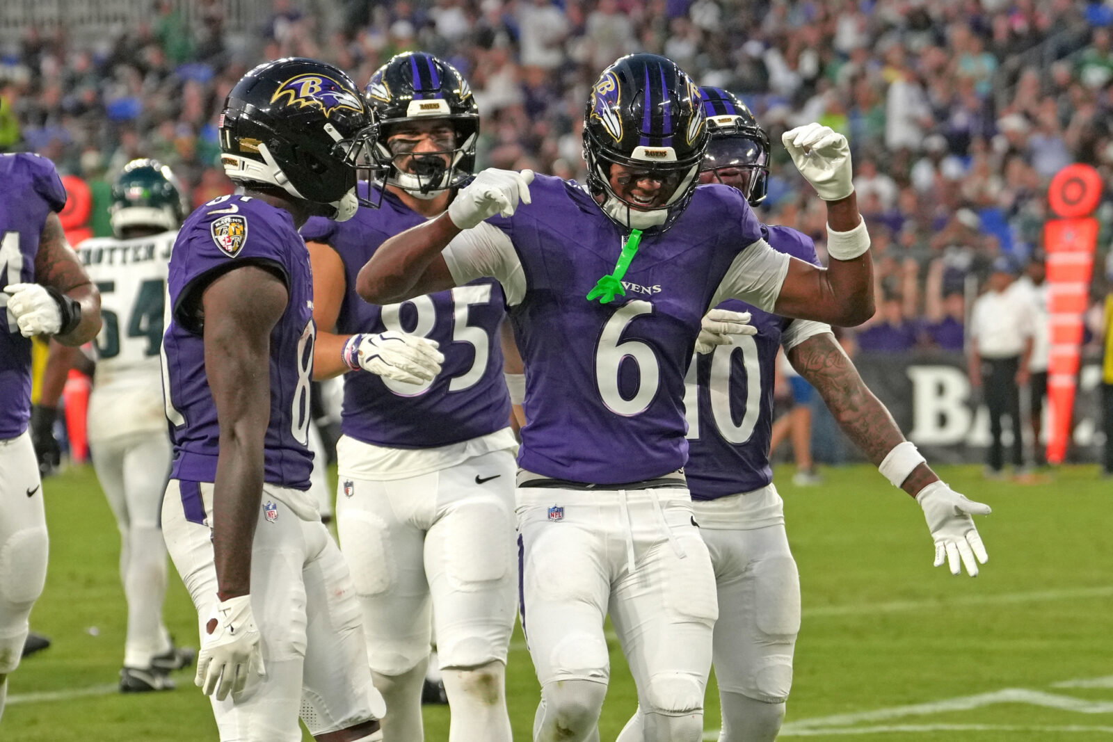 Aug 15, 2026; Baltimore, Maryland, USA; Baltimore Ravens wide receiver Ja’Kobi Lane (6) is greeted by teammates after his touchdown catch during the second quarter against the Philadelphia Eagles at M&T Bank Stadium. Mandatory Credit: Mitch Stringer-Imagn Images