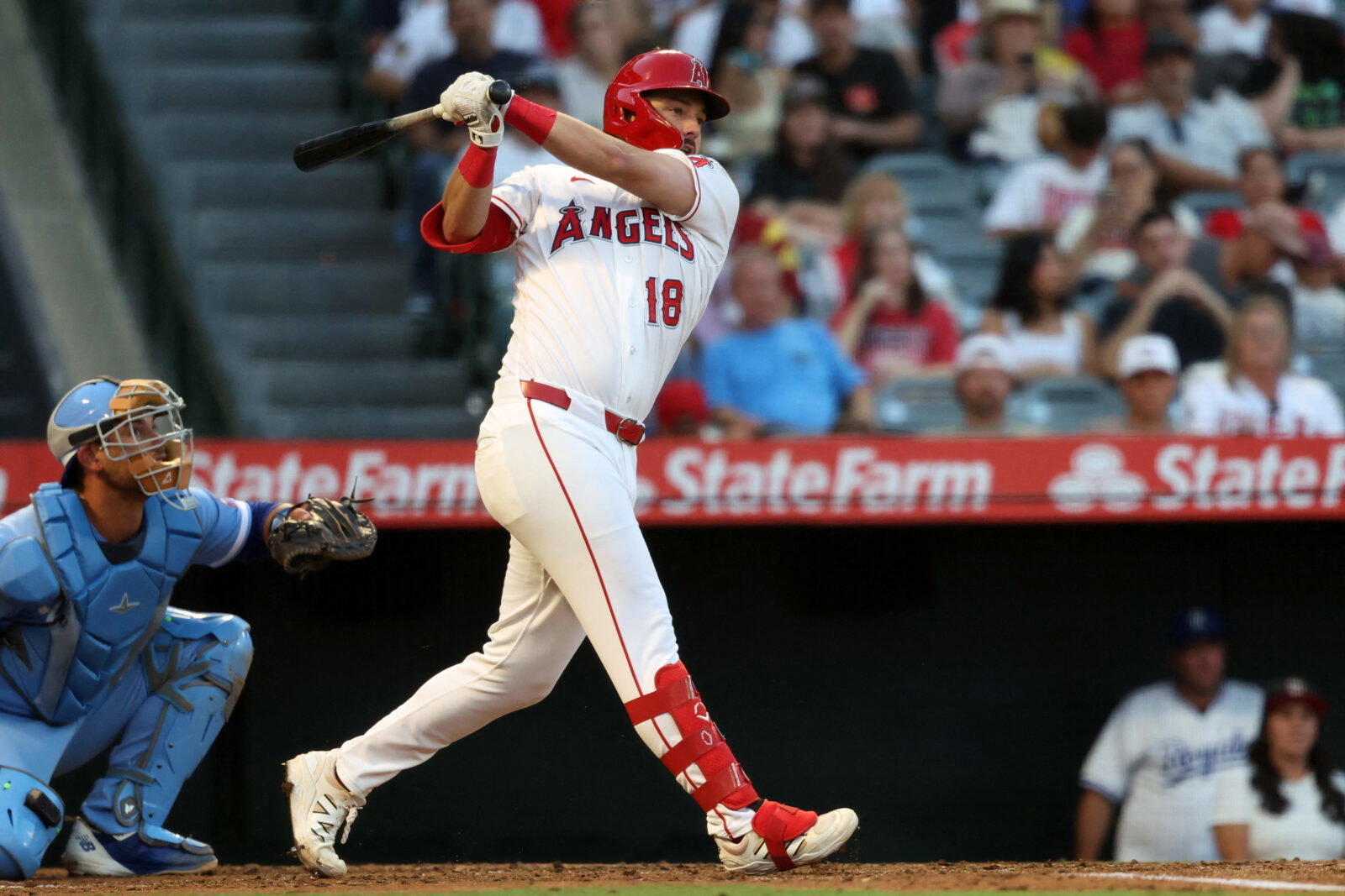 Aug 15, 2026; Anaheim, California, USA; Los Angeles Angels first baseman Nolan Schanuel (18) hits a single during the third inning against the Kansas City Royals at Angel Stadium. Mandatory Credit: Kiyoshi Mio-Imagn Images