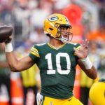 Aug 21, 2026; Denver, Colorado, USA; Green Bay Packers quarterback Jordan Love (10) during in the first quarter of a preseason game against the Denver Broncos at Empower Field at Mile High. Mandatory Credit: Ron Chenoy-Imagn Images