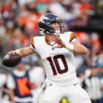 Aug 21, 2026; Denver, Colorado, USA; Denver Broncos quarterback Bo Nix (10) during the first quarter of a preseason game against the Green Bay Packers at Empower Field at Mile High. Mandatory Credit: Ron Chenoy-Imagn Images