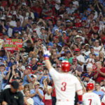 Aug 22, 2026; Philadelphia, Pennsylvania, USA; Fans react in front of Philadelphia Phillies first baseman Bryce Harper (3) as he crosses home plate after hitting a two RBI home run during the sixth inning against the St. Louis Cardinals at Citizens Bank Park. Mandatory Credit: Bill Streicher-Imagn Images