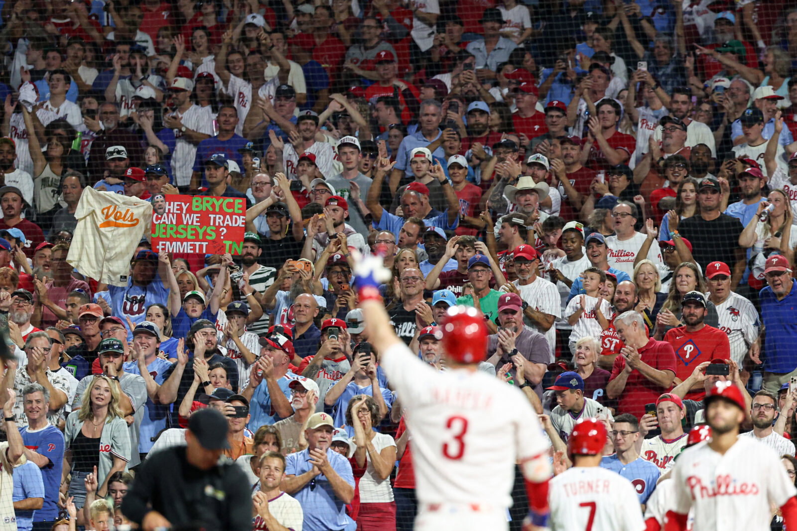 Aug 22, 2026; Philadelphia, Pennsylvania, USA; Fans react in front of Philadelphia Phillies first baseman Bryce Harper (3) as he crosses home plate after hitting a two RBI home run during the sixth inning against the St. Louis Cardinals at Citizens Bank Park. Mandatory Credit: Bill Streicher-Imagn Images