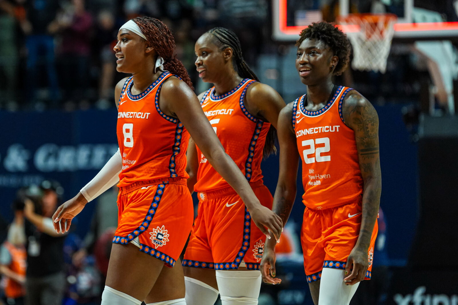 Aug 25, 2026; Uncasville, Connecticut, USA; Connecticut Sun forward Aaliyah Edwards (8), guard Saniya Rivers (22) and guard Kennedy Burke (25) react after defeating the Chicago Sky in the second half at Mohegan Sun Arena. Mandatory Credit: David Butler II-Imagn Images