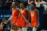 Aug 25, 2026; Uncasville, Connecticut, USA; Connecticut Sun forward Aaliyah Edwards (8), guard Saniya Rivers (22) and guard Kennedy Burke (25) react after defeating the Chicago Sky in the second half at Mohegan Sun Arena. Mandatory Credit: David Butler II-Imagn Images