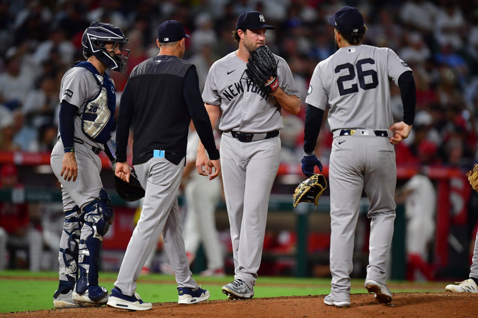 Sep 1, 2026; Anaheim, California, USA; New York Yankees pitcher Gerrit Cole (45) is relieved against the Los Angeles Angels during the sixth inning at Angel Stadium. Mandatory Credit: Gary A. Vasquez-Imagn Images