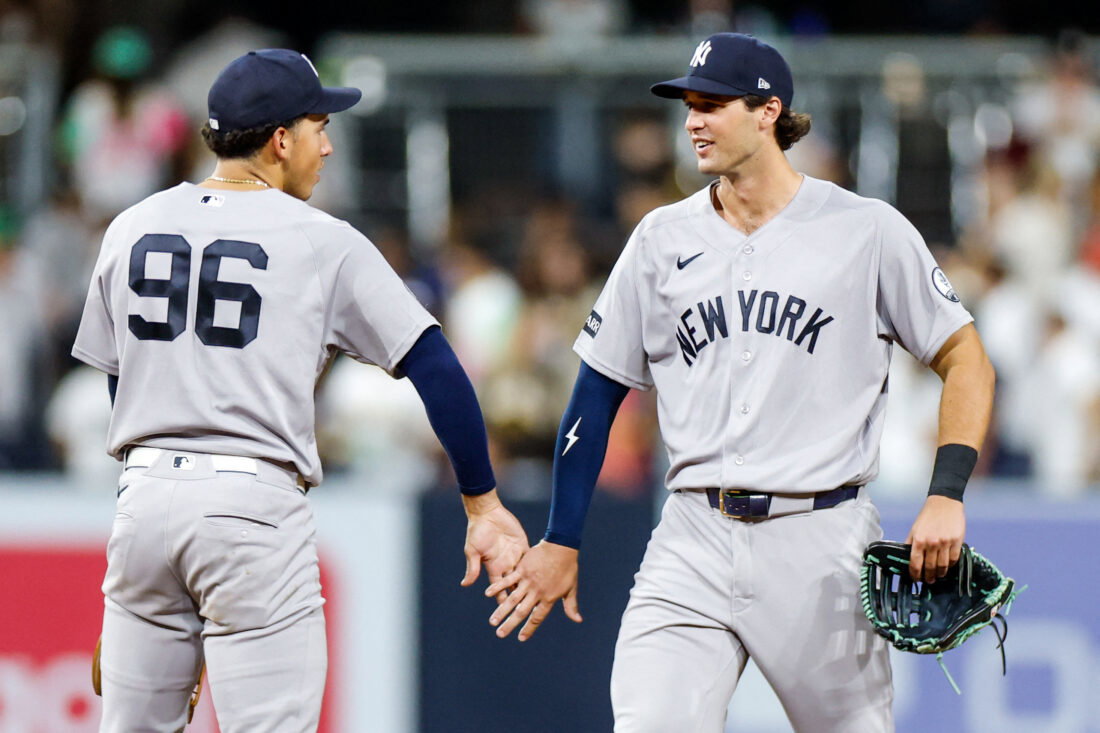 Sep 5, 2026; San Diego, California, USA; New York Yankees center fielder Spencer Jones (78) celebrates with shortstop George Lombard Jr. (96) after defeating the San Diego Padres at Petco Park. Mandatory Credit: David Frerker-Imagn Images