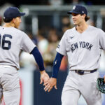 Sep 5, 2026; San Diego, California, USA; New York Yankees center fielder Spencer Jones (78) celebrates with shortstop George Lombard Jr. (96) after defeating the San Diego Padres at Petco Park. Mandatory Credit: David Frerker-Imagn Images