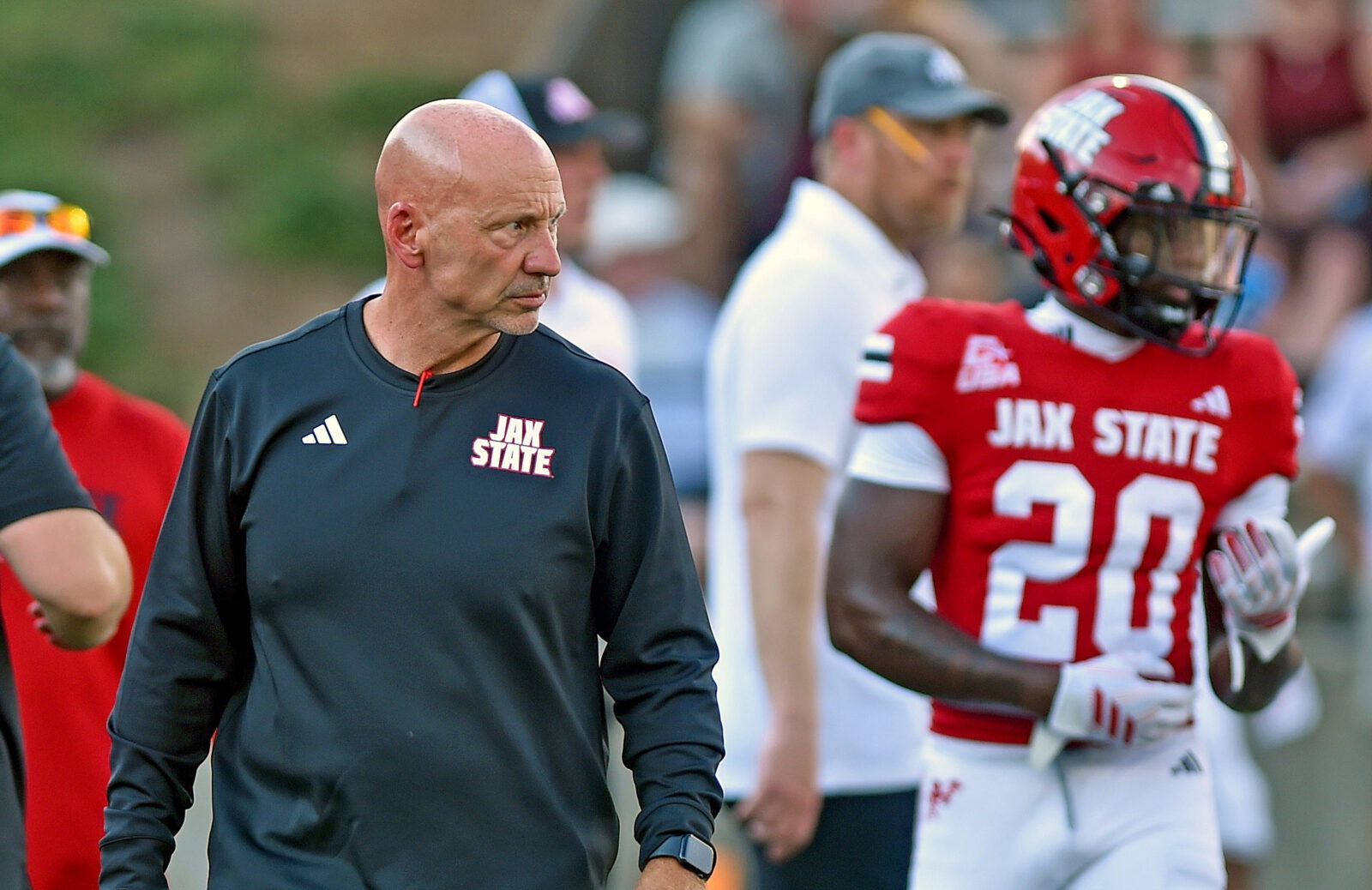 Jax State Coach Charles Kelly talks with players during college school football action at AmFirst Stadium in Jacksonville, Alabama September 5, 2026. (Dave Hyatt / Hyatt Media LLC)