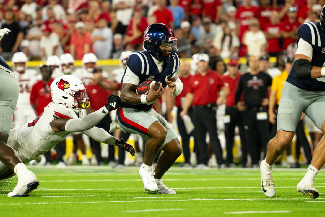 Sep 6, 2026; Nashville, Tennessee, USA; Ole Miss Rebels quarterback Trinidad Chambliss (6) runs with the ball against the Louisville Cardinals during the second half at Nissan Stadium. Mandatory Credit: Steve Roberts-Imagn Images