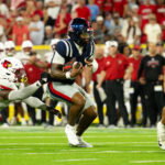 Sep 6, 2026; Nashville, Tennessee, USA; Ole Miss Rebels quarterback Trinidad Chambliss (6) runs with the ball against the Louisville Cardinals during the second half at Nissan Stadium. Mandatory Credit: Steve Roberts-Imagn Images