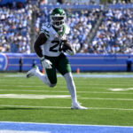 Sep 13, 2026; Nashville, Tennessee, USA; New York Jets running back Breece Hall (20) runs with the ball for a touchdown against the Tennessee Titans during the third quarter at Nissan Stadium. Mandatory Credit: Steve Roberts-Imagn Images