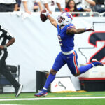 Sep 13, 2026; Houston, Texas, USA; Buffalo Bills wide receiver DJ Moore (2) reacts after scoring a touchdown during the second quarter against the Houston Texans at Reliant Stadium. Mandatory Credit: Troy Taormina-Imagn Images