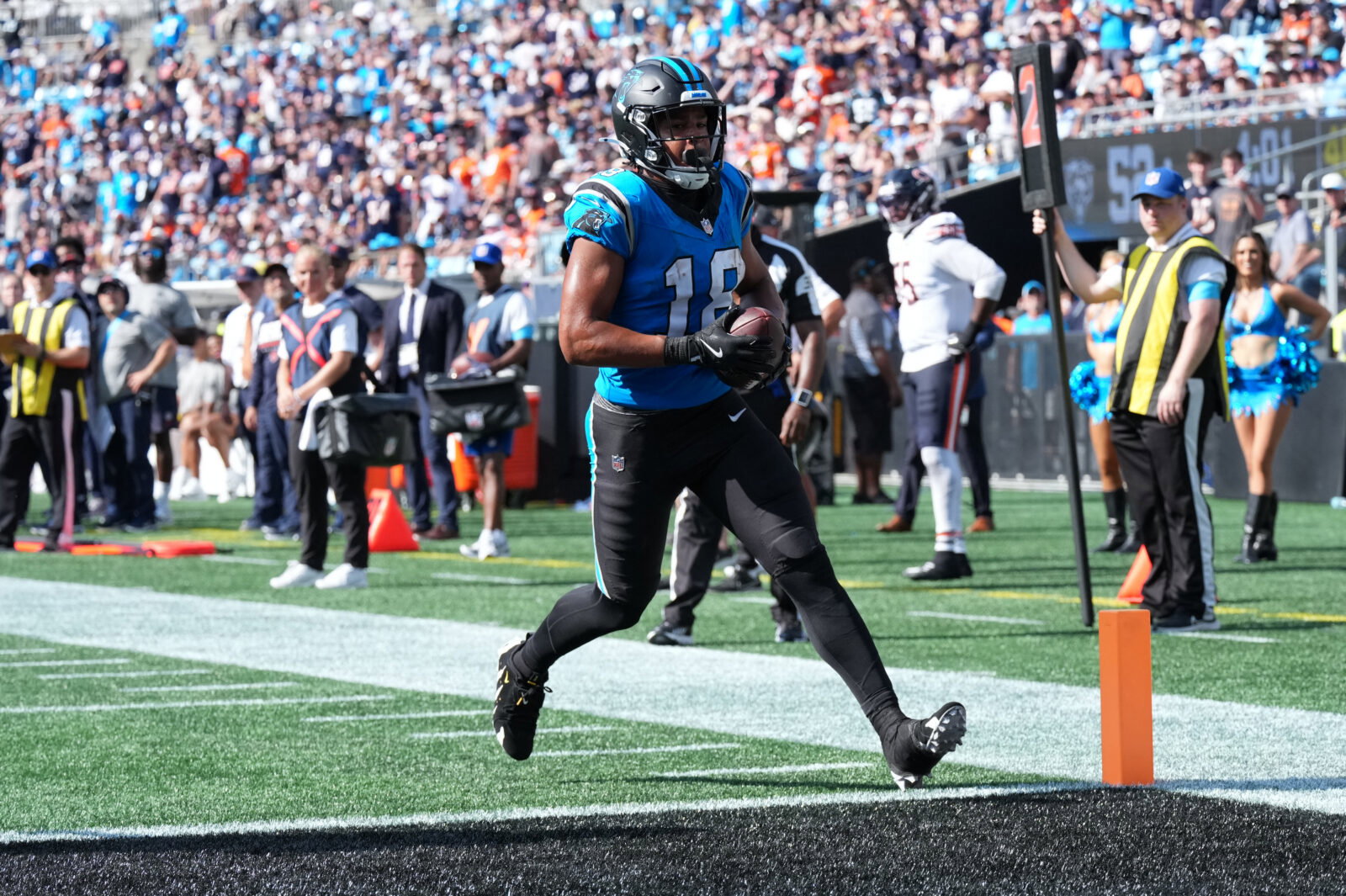 Sep 13, 2026; Charlotte, North Carolina, USA; Carolina Panthers wide receiver Jalen Coker (18) scores a touchdown in the second half against the Chicago Bears at Bank of America Stadium. Mandatory Credit: Jim Dedmon-Imagn Images
