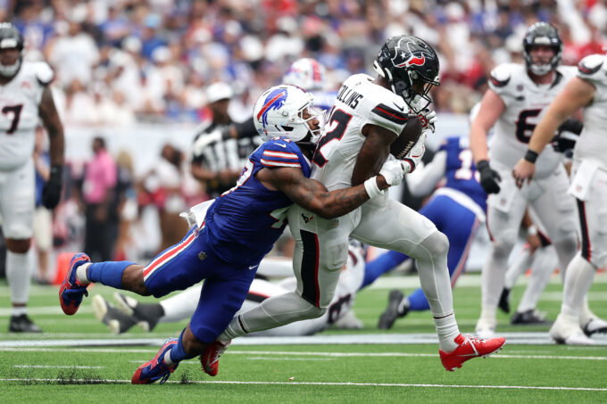 Sep 13, 2026; Houston, Texas, USA; Houston Texans wide receiver Nico Collins (12) runs with the ball after a catch against Buffalo Bills cornerback Christian Benford (47) during the fourth quarter at Reliant Stadium. Mandatory Credit: Troy Taormina-Imagn Images