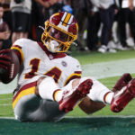 Sep 13, 2026; Philadelphia, Pennsylvania, USA; Washington Commanders wide receiver Antonio Williams (14) catches a pass for a touchdown against the Philadelphia Eagles during the second half at Lincoln Financial Field. Mandatory Credit: Bill Streicher-Imagn Images