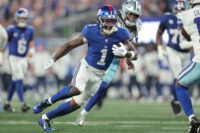 Sep 13, 2026; East Rutherford, New Jersey, USA; New York Giants wide receiver Malik Nabers (1) carries the ball against the Dallas Cowboys during the third quarter at MetLife Stadium. Mandatory Credit: Brad Penner-Imagn Images