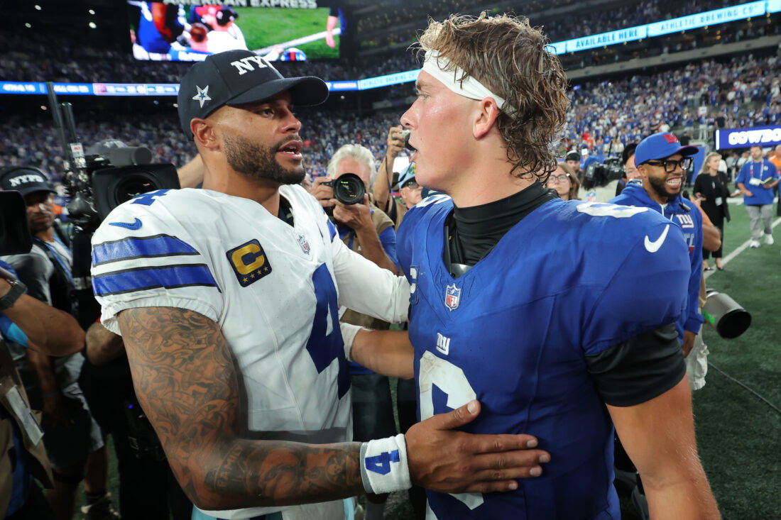 Sep 13, 2026; East Rutherford, New Jersey, USA; Dallas Cowboys quarterback Dak Prescott (4) speaks with New York Giants quarterback Jaxson Dart (6) after the game at MetLife Stadium. Mandatory Credit: Brad Penner-Imagn Images