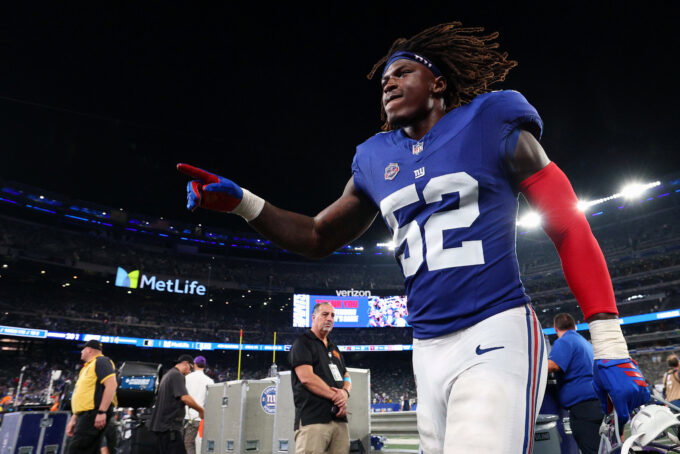 Sep 13, 2026; East Rutherford, New Jersey, USA; New York Giants linebacker Arvell Reese (52) celebrates as he leaves the field following a win against the Dallas Cowboys in the game at MetLife Stadium. Mandatory Credit: Vincent Carchietta-Imagn Images