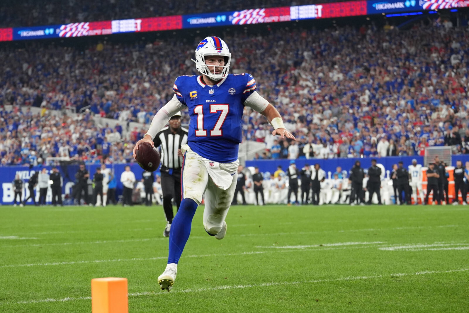 Sep 17, 2026; Orchard Park, New York, USA; Buffalo Bills quarterback Josh Allen (17) runs to score a touchdown against the Detroit Lions during the second half at New Highmark Stadium. Mandatory Credit: Gregory Fisher-Imagn Images